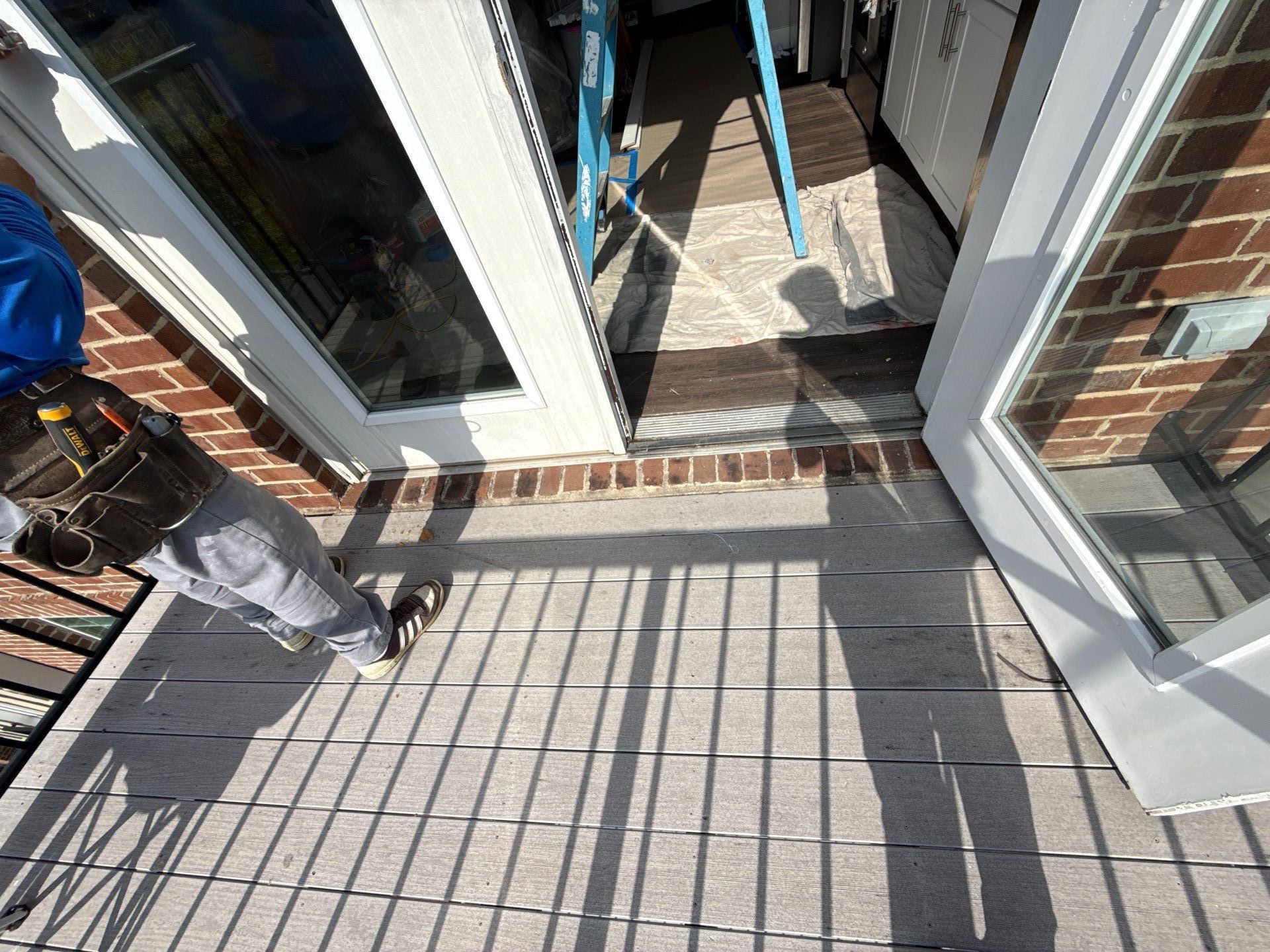Existing door and threshold area shown from balcony above