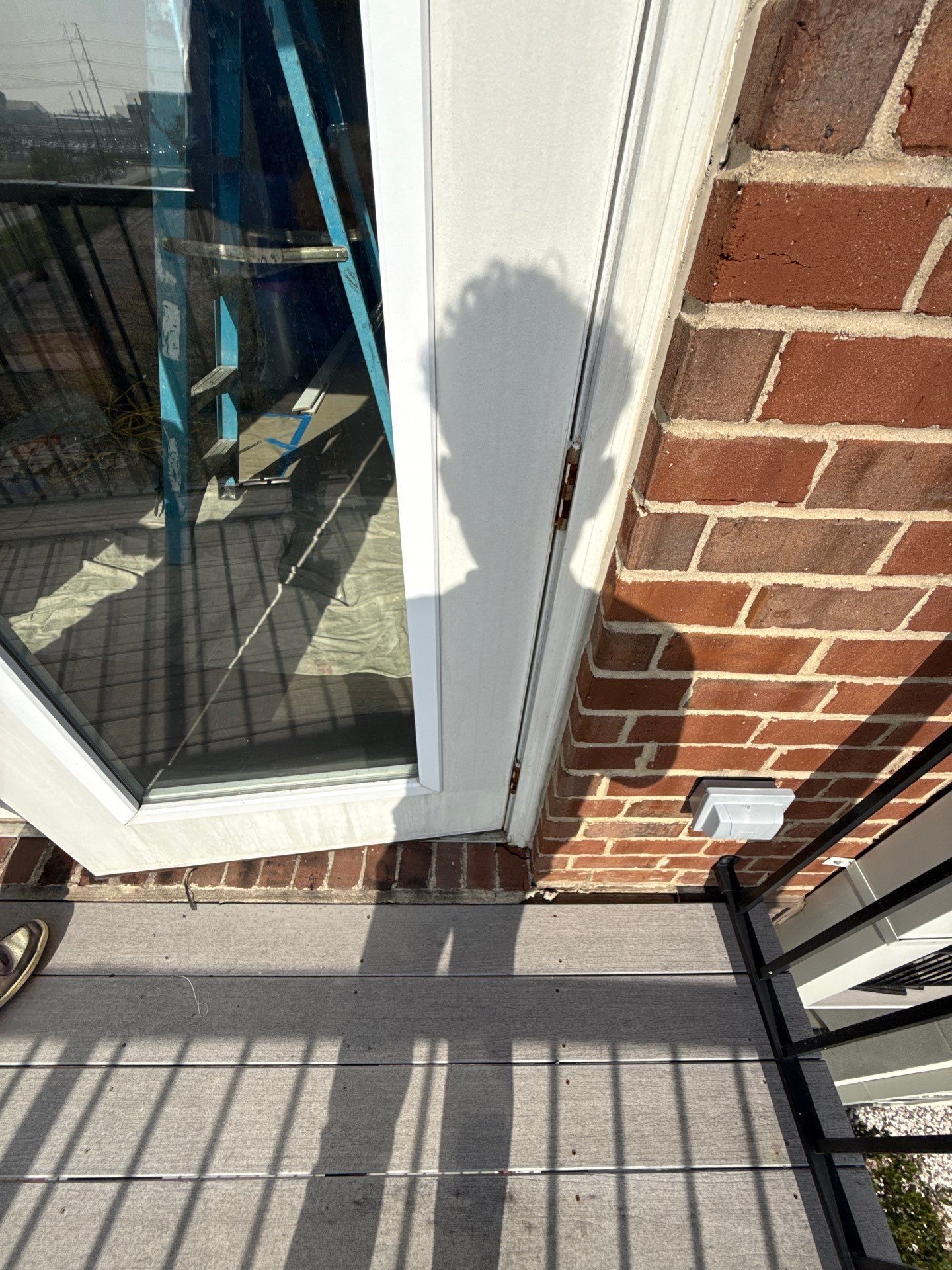 Bottom corner of existing exterior door assembly