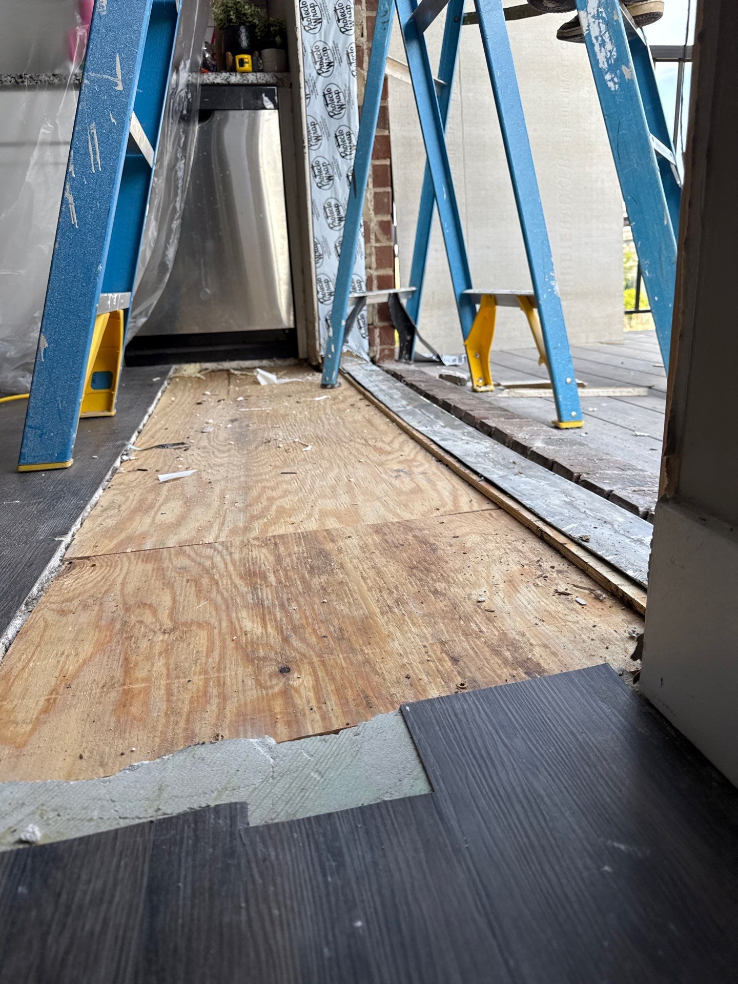 Weather-resistant flashing applied along the door jamb to help protect the replacement installation against water intrusion