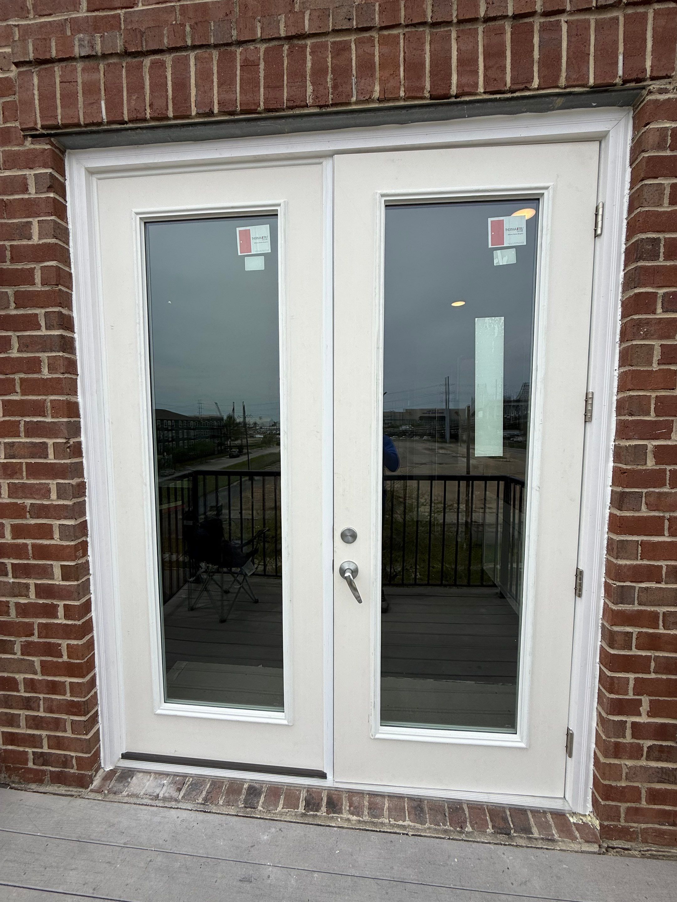 Installed replacement French doors, exterior elevation